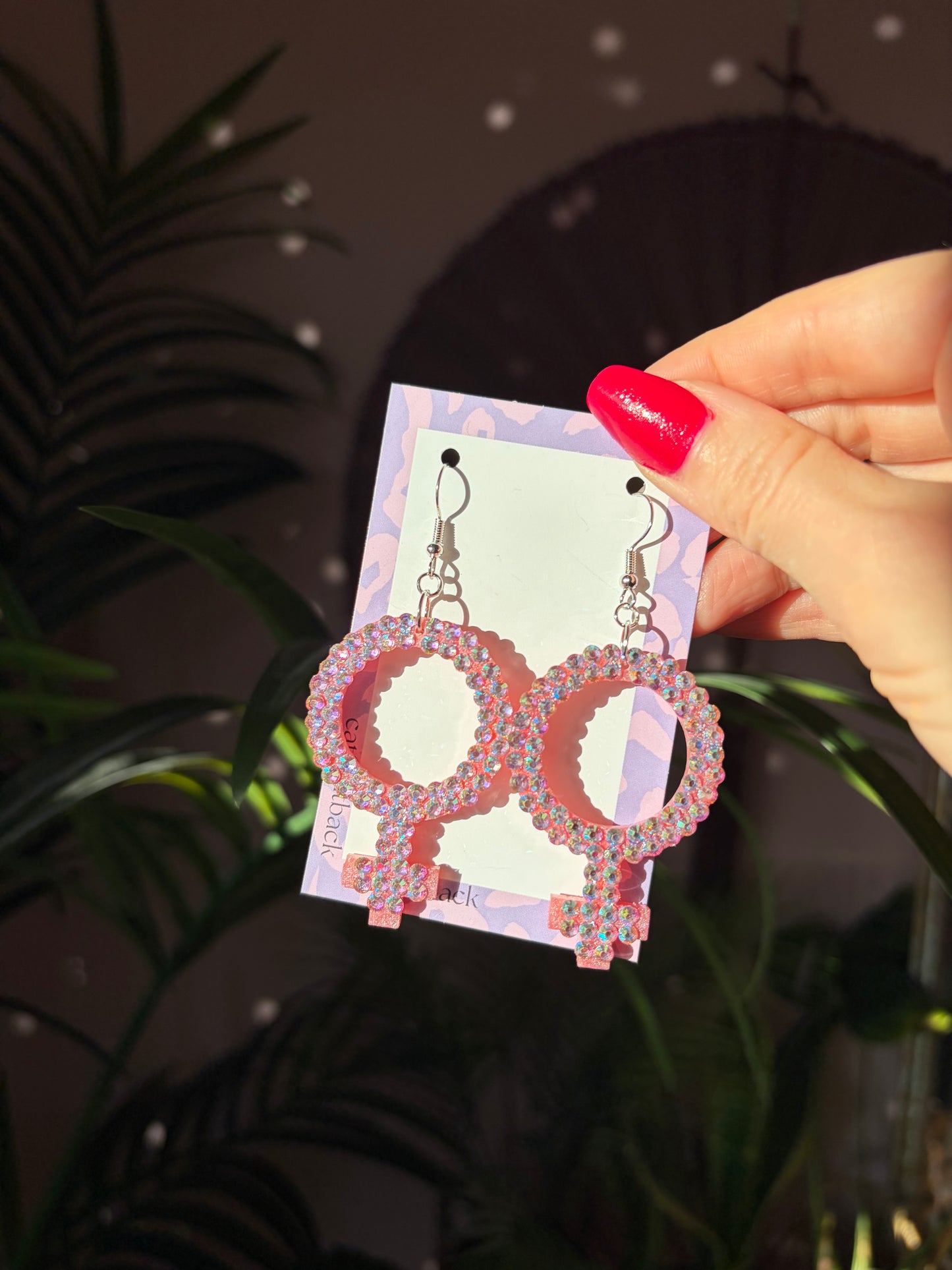 Rosa Kvinnotecken med Rhinestones