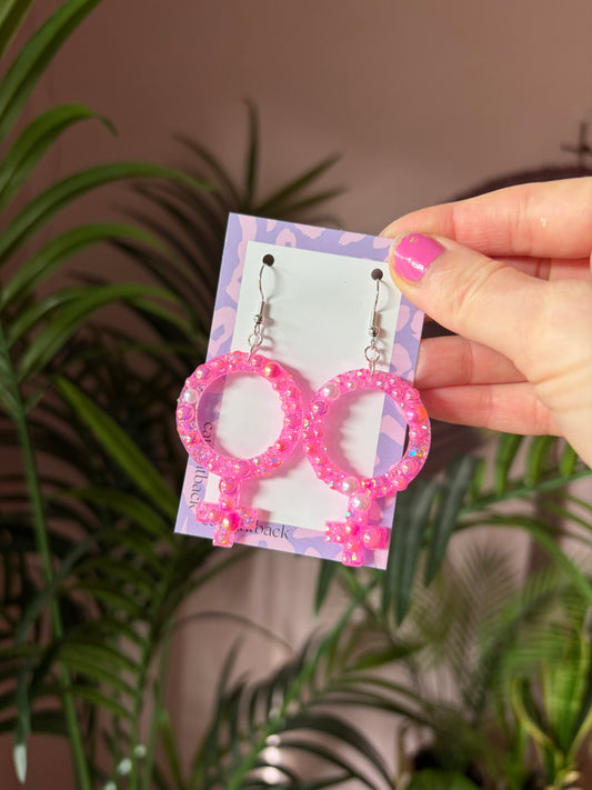 Rosa Kvinnotecken med Rhinestones