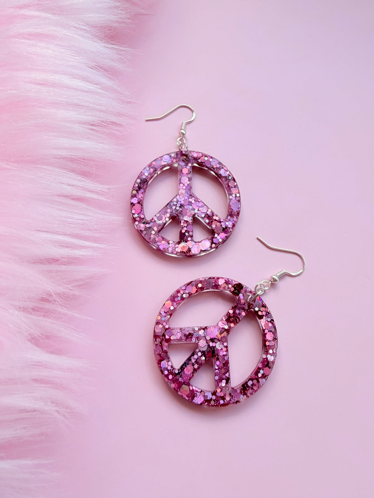 Glittriga Rosa Peacetecken