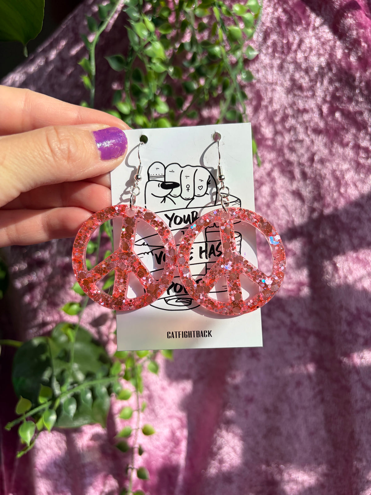 Glittriga Rosa Peacetecken