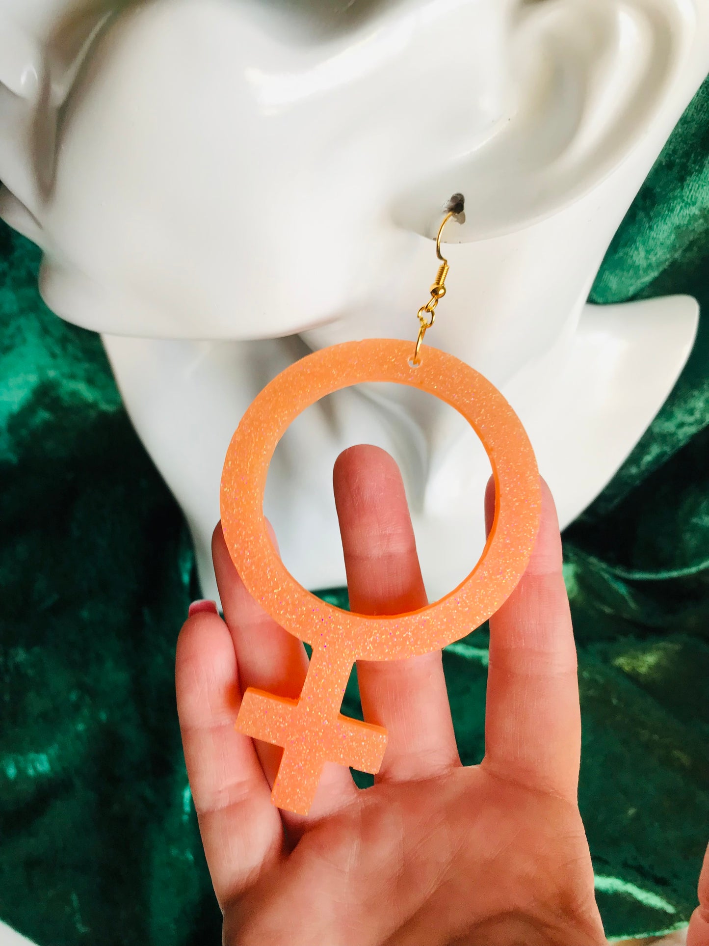 Glittriga Orange Kvinnotecken