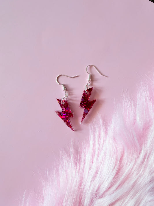 Glittriga Rosa Blixtar