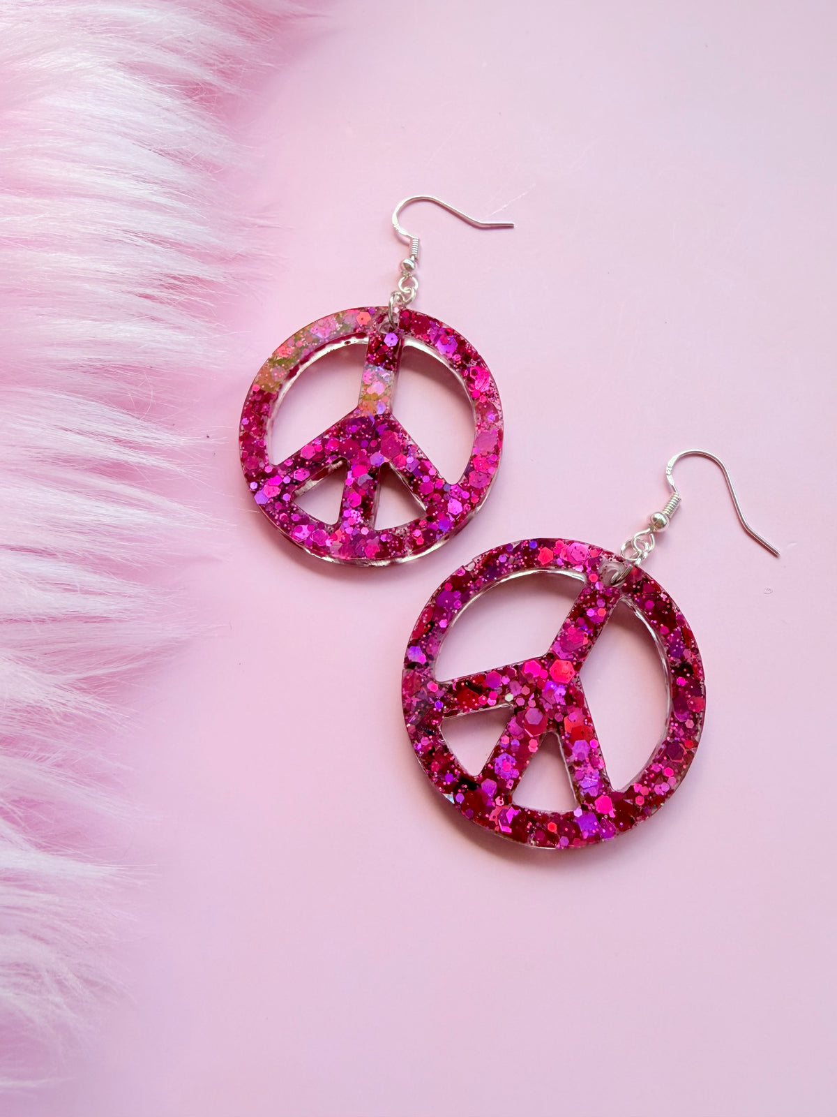 Glittriga Rosa Peacetecken