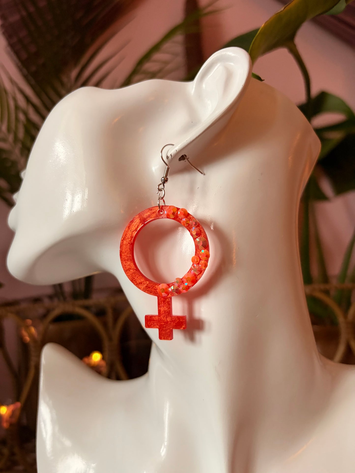 Orange Kvinnotecken med Rhinestones