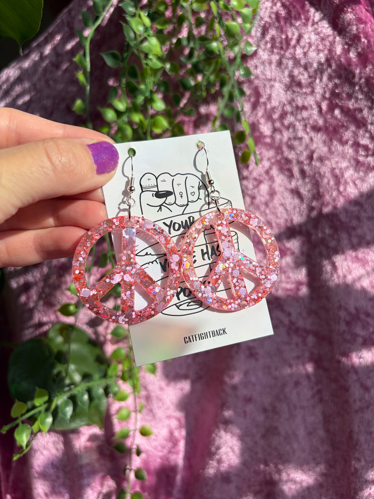 Glittriga Rosa Peacetecken