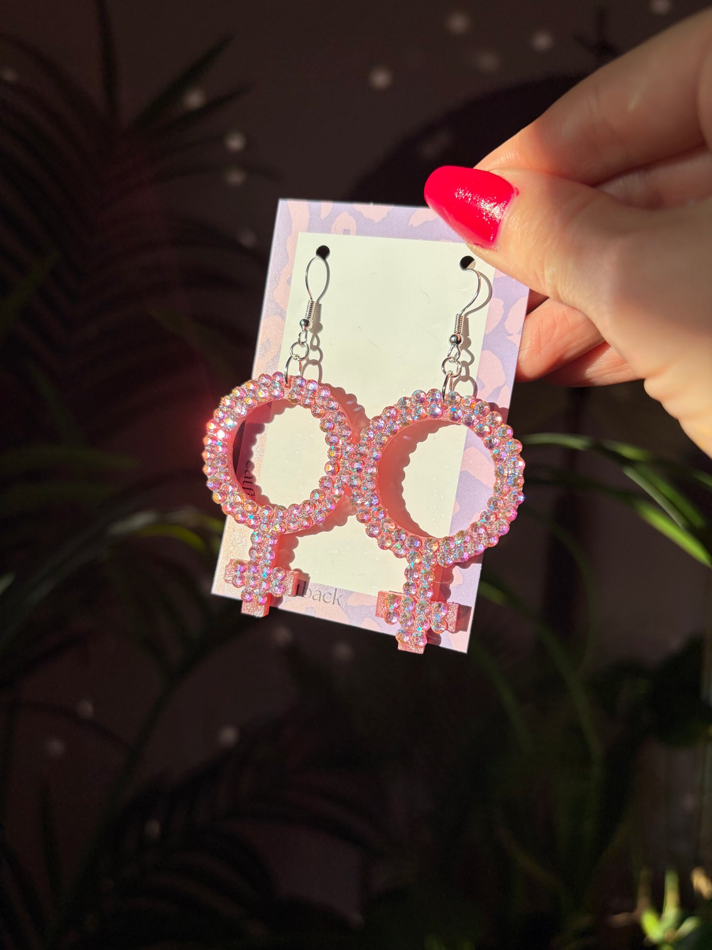 Rosa Kvinnotecken med Rhinestones