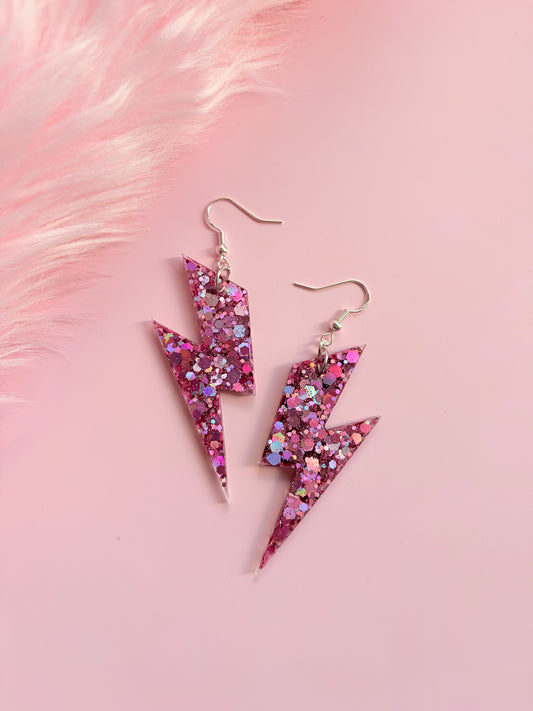 Glittriga Rosa Blixtar