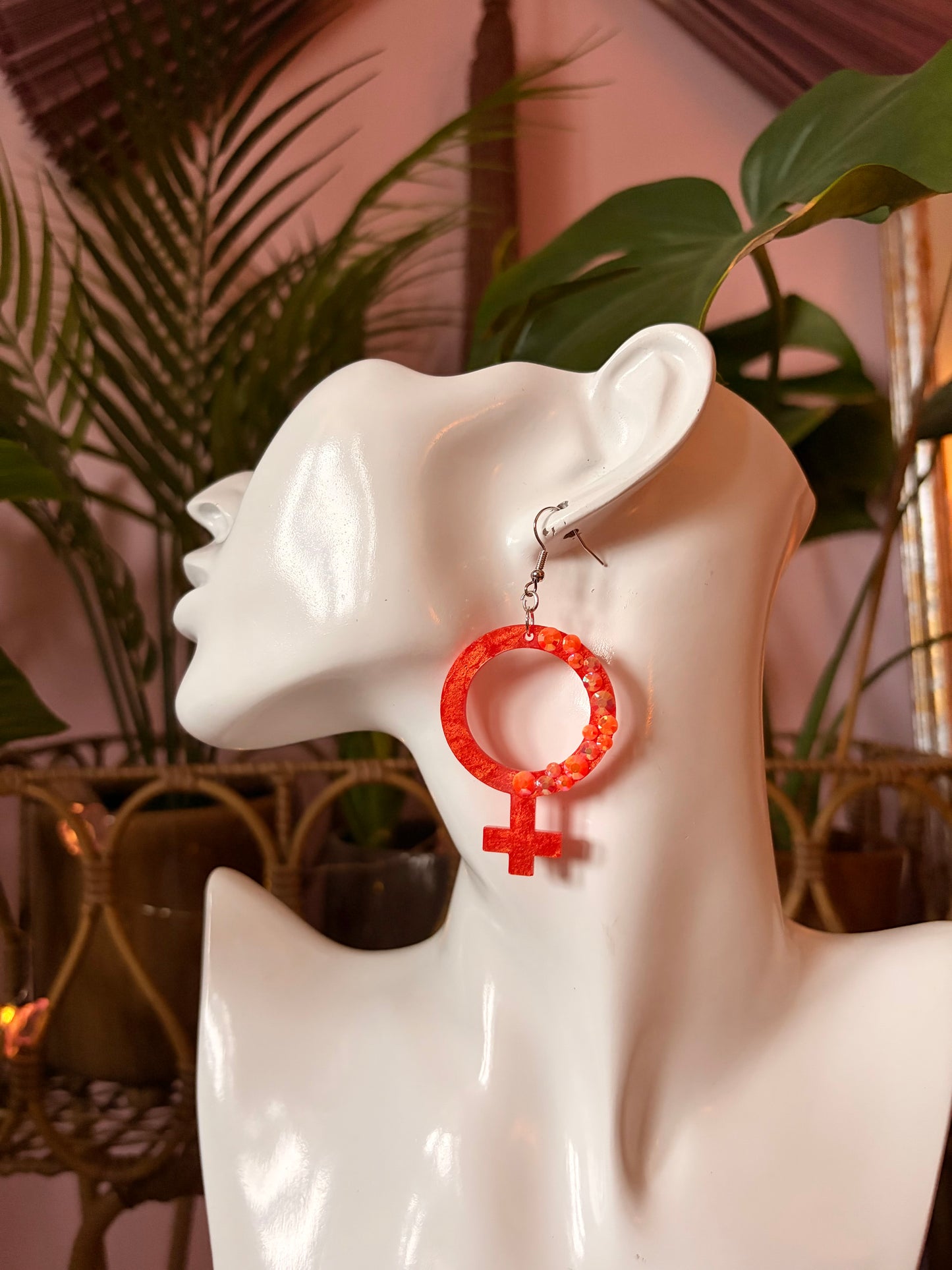 Orange Kvinnotecken med Rhinestones