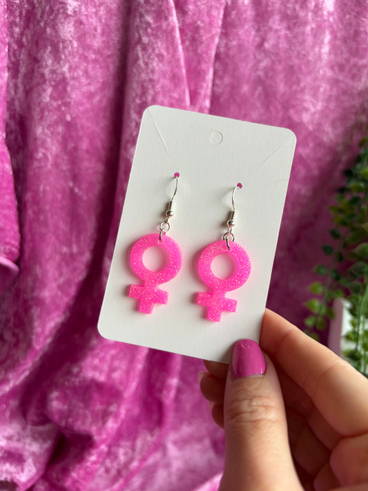 Glittriga rosa kvinnotecken