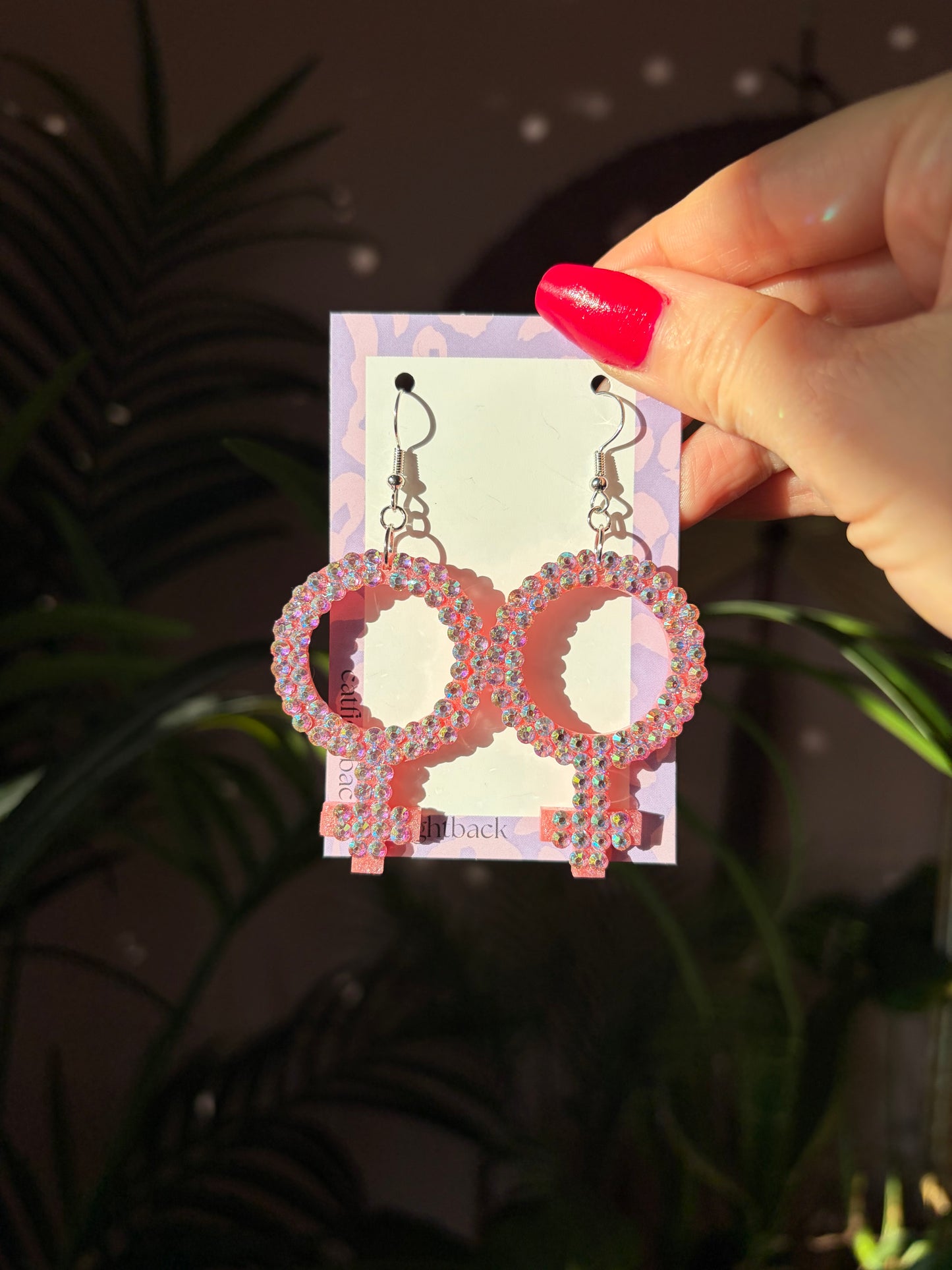 Rosa Kvinnotecken med Rhinestones