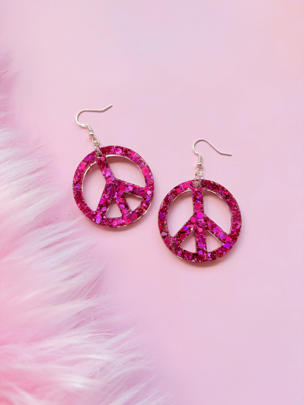 Glittriga Rosa Peacetecken