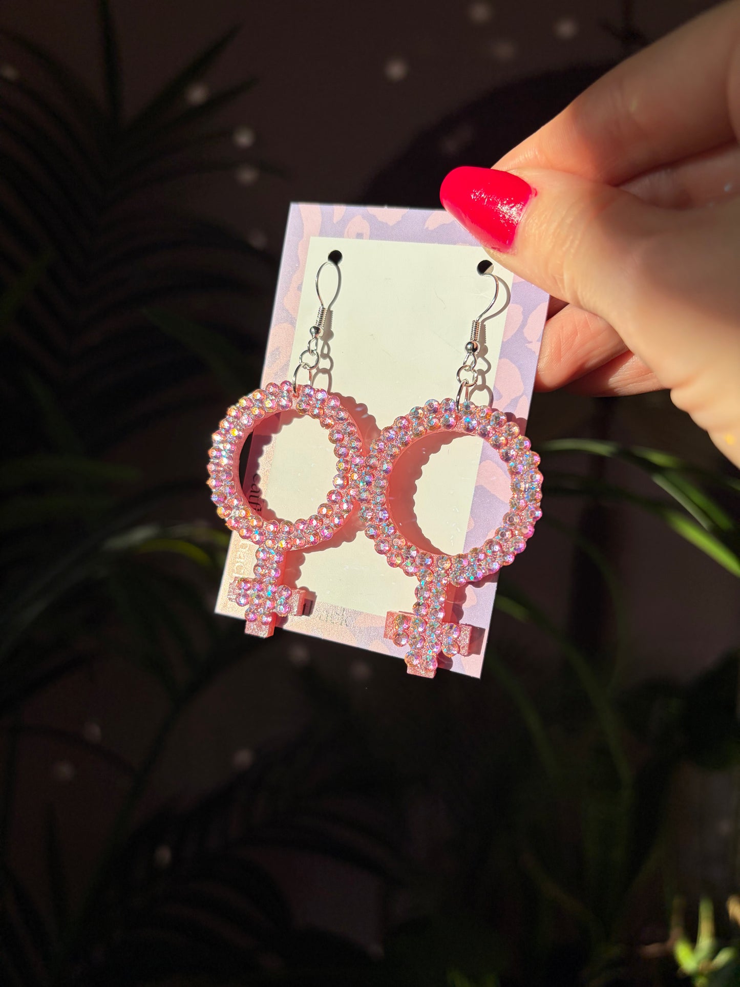 Rosa Kvinnotecken med Rhinestones