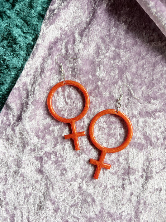 Orange Kvinnotecken