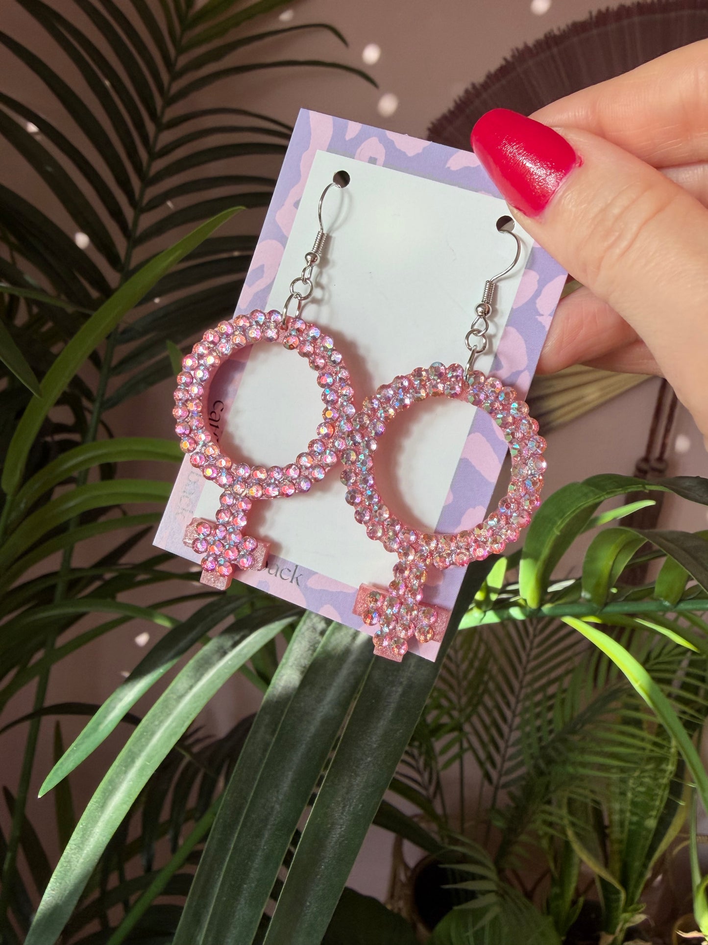 Rosa Kvinnotecken med Rhinestones
