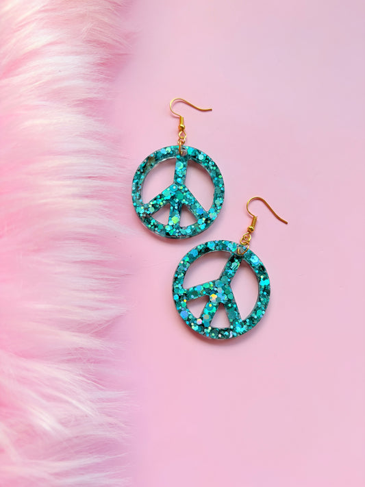 Glittriga Turkos Peacetecken