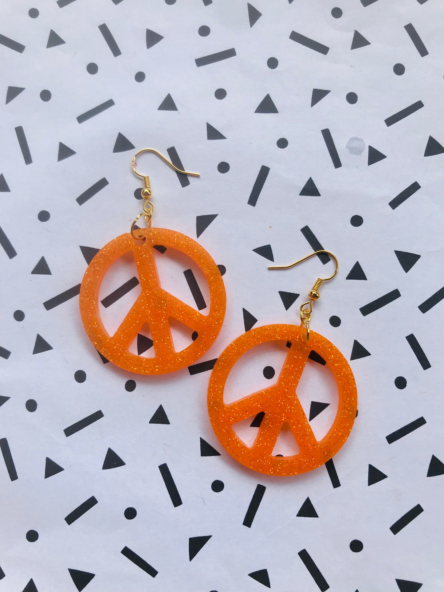 Orange Glittriga Peacetecken