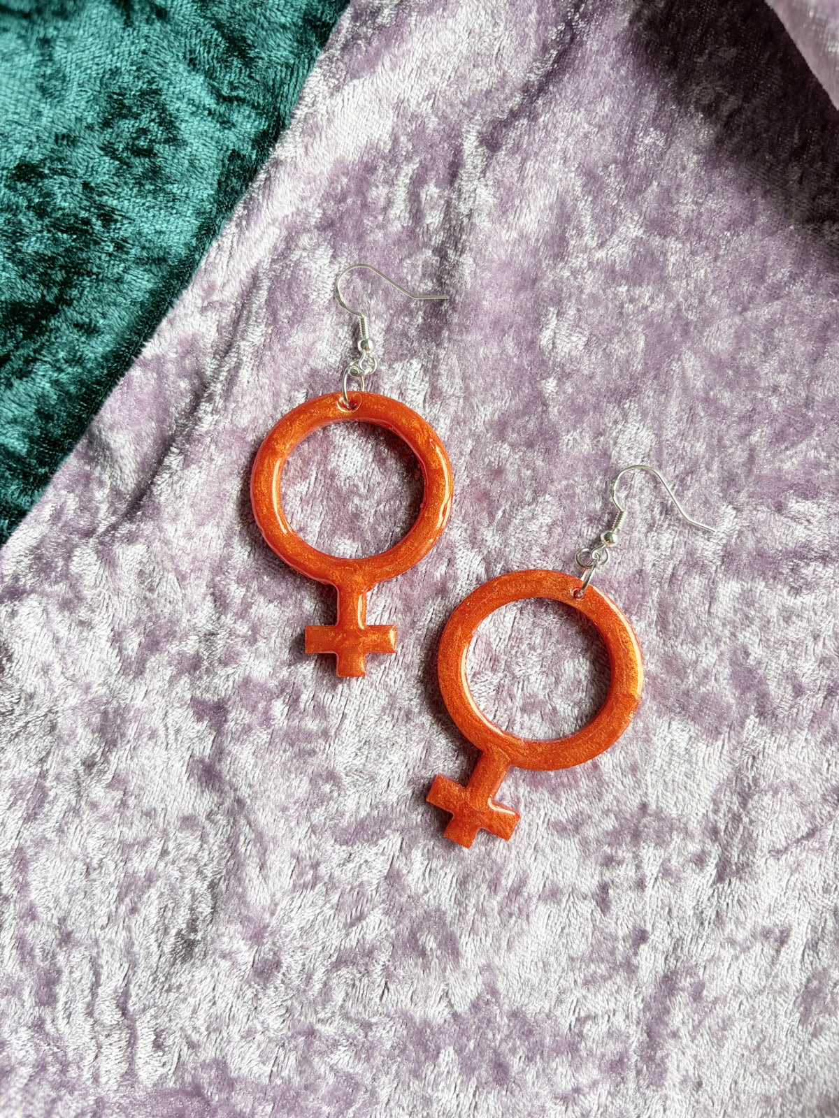 Orange Kvinnotecken
