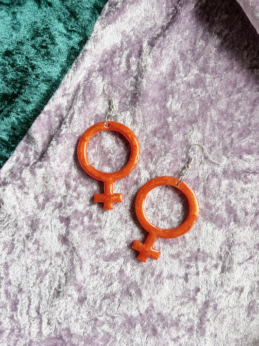 Orange Kvinnotecken