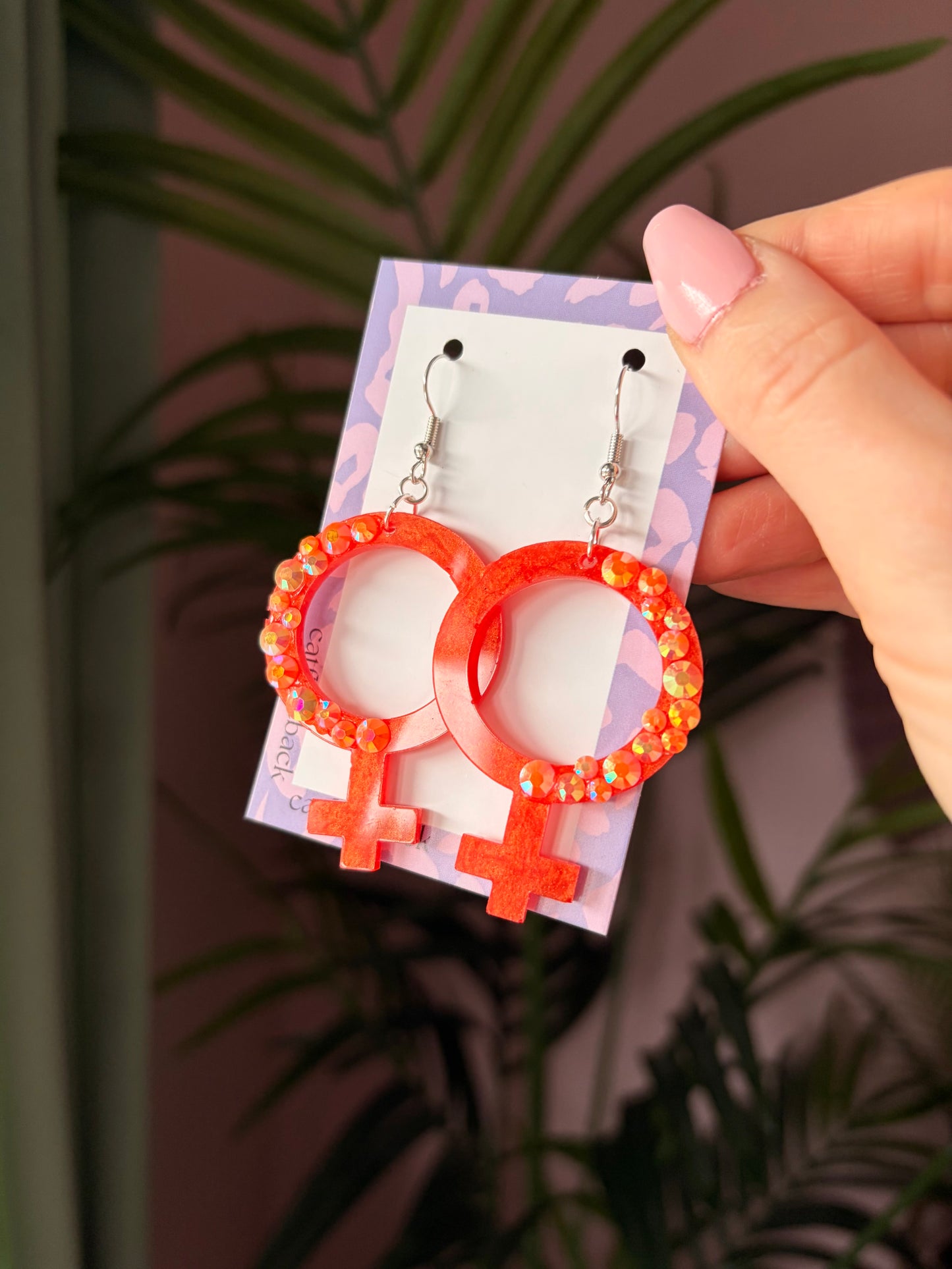 Orange Kvinnotecken med Rhinestones