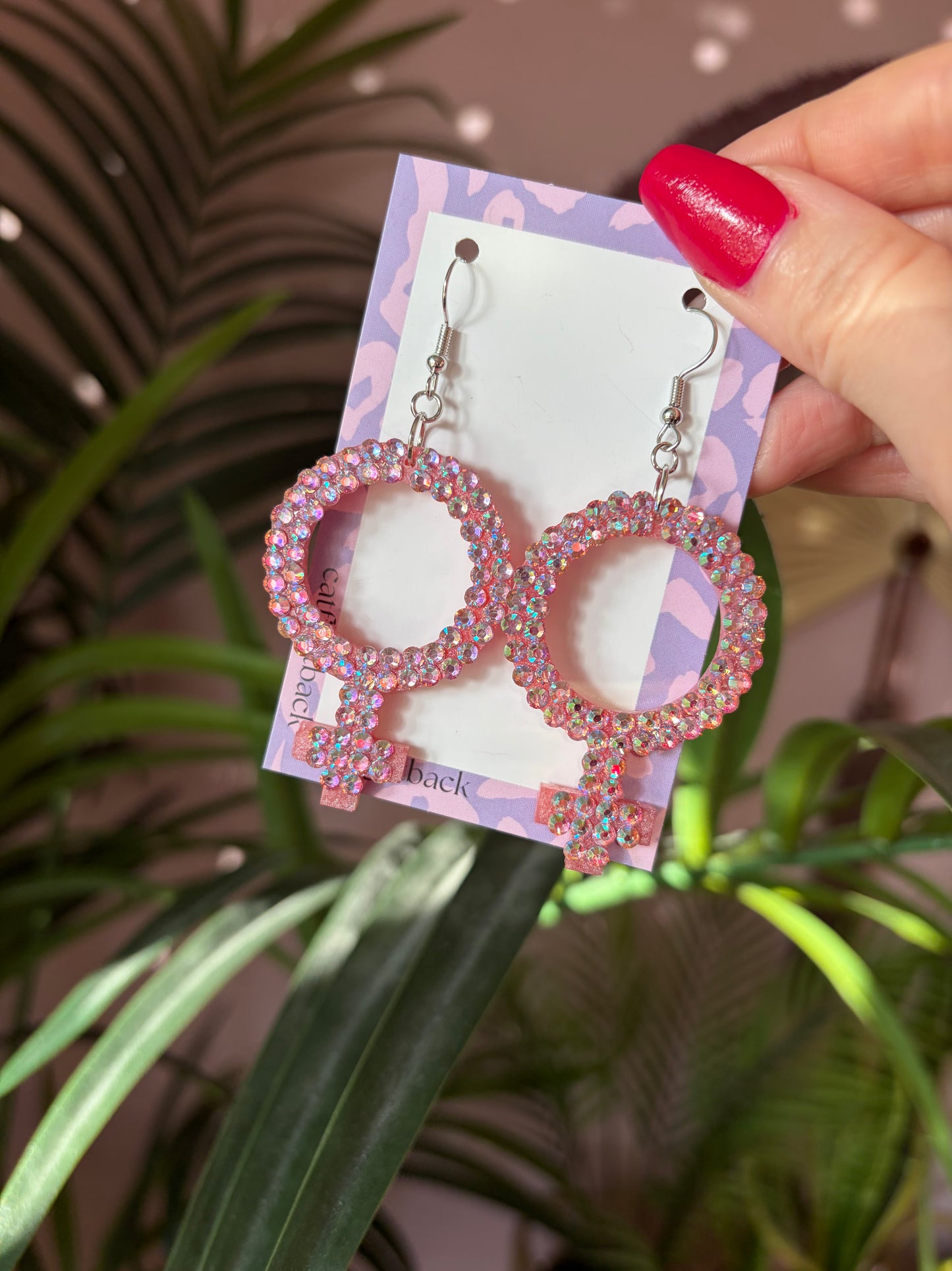 Rosa Kvinnotecken med Rhinestones