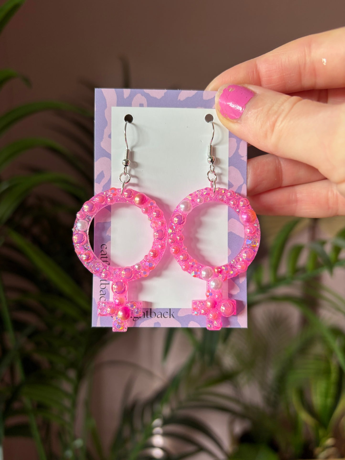 Rosa Kvinnotecken med Rhinestones